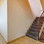 Fabhotel Tiru Residency