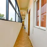 Fabhotel Tiru Residency