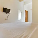 Fabhotel Tiru Residency