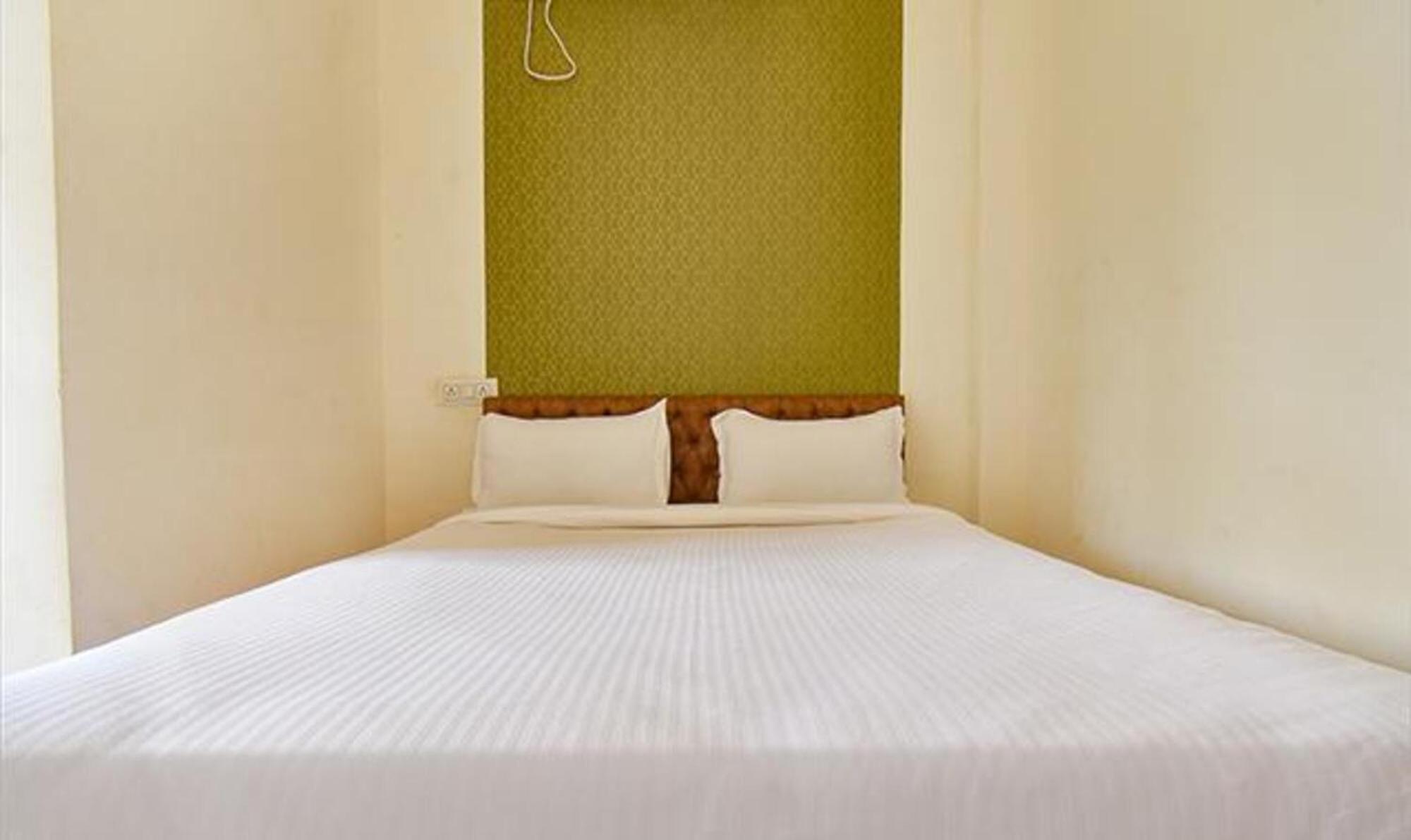 Fabhotel Tiru Residency